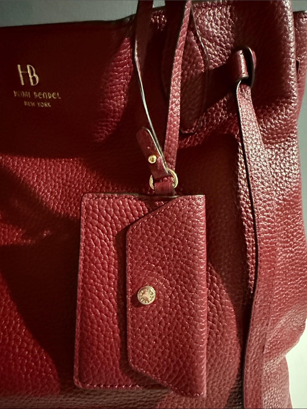 Henri Bendel tote bag features a pebbled texture and gold-toned hardware. - Picture 3 of 11
